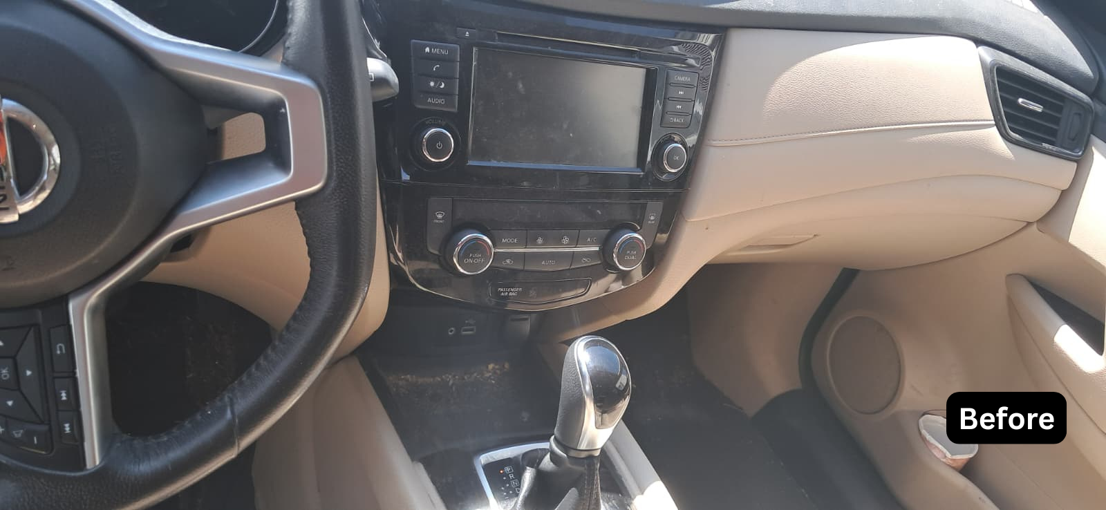 Nissan dashboard before cleaning